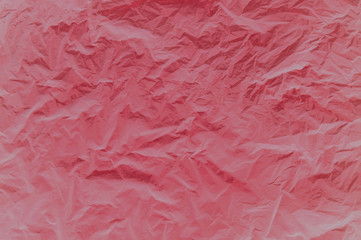 Crumpled fabric in red. Abstract background. Background image of crumpled fabric.