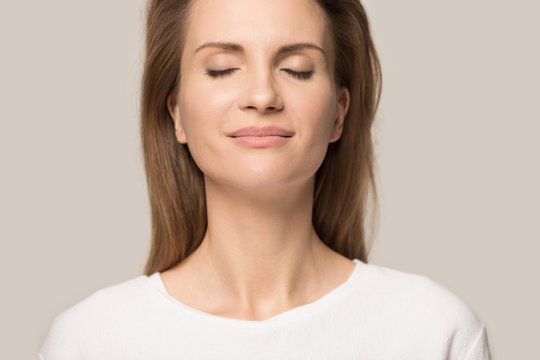 Close up of happy woman relax breathing fresh air