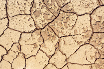 Top view of Dry land in the construction area. Cracked ground background