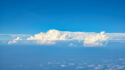 Obraz premium Background panorama of interesting clouds in the sky with reflections in the air
