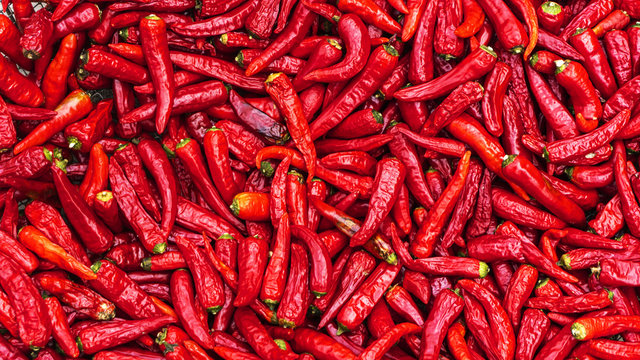 Close up group of red hot chilli peppers  pattern texture backgr