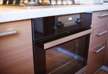 modern electric oven in the kitchen interior