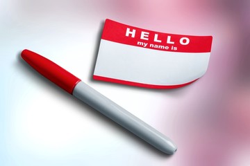 Blue Hello My Name Is Tag and pen on table with Copy Space