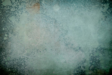 green grungy splattered canvas backdrop or texture
