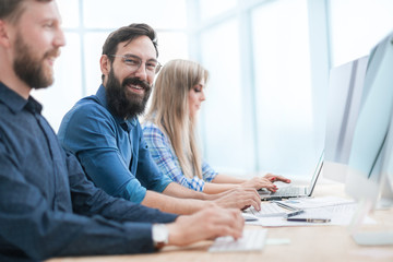 group of business people working in the office together