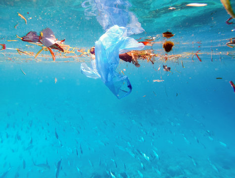 The underwater shot of rifting of plastic pollution bag
