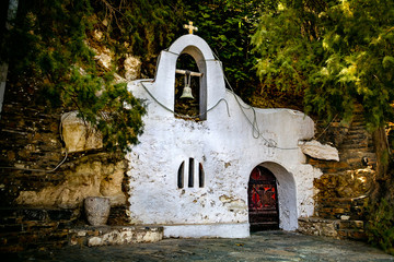 Old chapel on the shore of fresh lake in Agios Nikolaos. Greece. Crete
