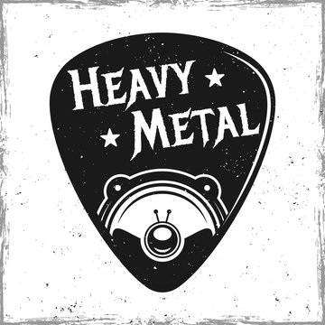 Guitar pick with speaker and text heavy metal