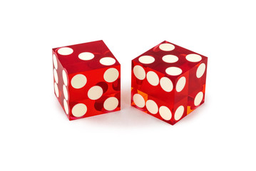 Two red professional game dice closeup isolated on a white background / three and five with a light shadow