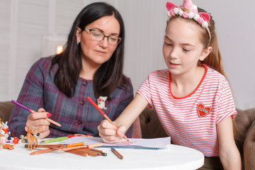 professional psychologist with a teenage girl. Disclosing a child through a drawing. The method of...