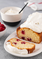 Cake with raspberries and whipped cream. Copy space.
