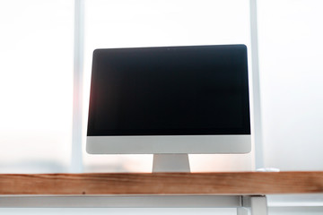 close up. personal computer on a wooden table in the office