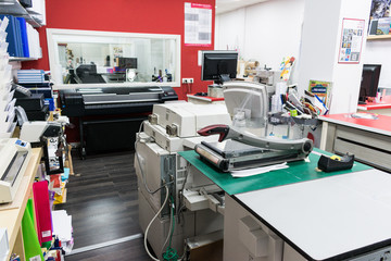 View of photocopy shop with work machines