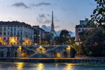 La Mole Antonelliana, most famous monument of Turin, with the River Po in first plane.