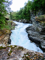 A man goes out of the darkness to the light black and white