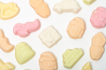 Background of sweets. Candy at Dutch Sinterklaas, pink, yellow, green, orange, strooigoed, isolated background