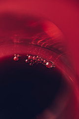 Bubbles in Red Wine - Macro Close-Up Shot