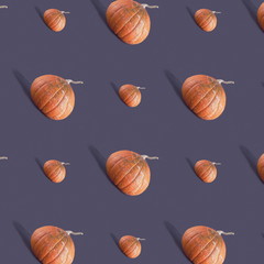Pumpkin seamless pattern on a black background.