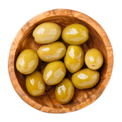 Whole green olives in wooden bowl isolated on white background. Top view, close-up.