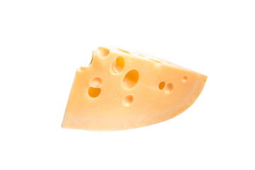 piece of Dutch cheese isolated close-up