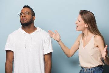 Multiracial couple having disagreement close to breakup situation