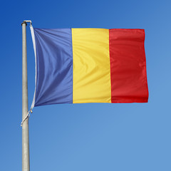 Romanian flag in the blue sky