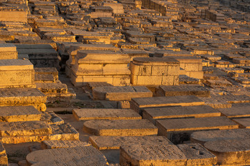Jerusalem old city district Jewish cemetery in sunset orange lighting UNESCO religion world famous heritage site   