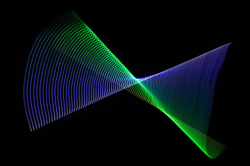 3d illustration. Multicolored abstract lines on black background. Light painting photography. Futuristic patterns