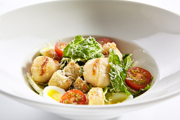 Delicious natural caesar with scallop closeup