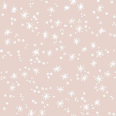 Snowfall with snowflakes on pastel background. Christmas and New Year seamless vector pattern