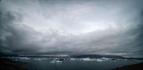 Fragments of iceberg in sea water. Iceland north sea