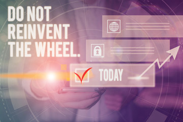 Fototapeta premium Conceptual hand writing showing Do Not Reinvent The Wheel. Concept meaning stop duplicating a basic method previously done Picture photo network scheme with modern smart device