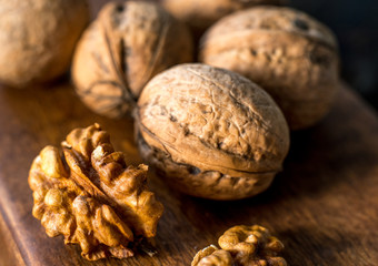 healthy walnuts on wooden background