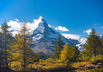 Stunning autumn scenery of famous alp peak Matterhorn. Swiss Alps, Valais, Switzerland