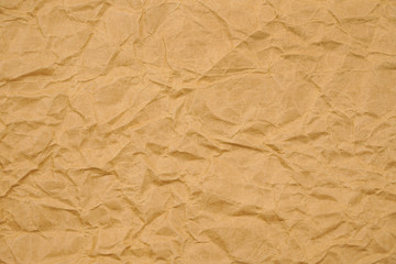 Brown crumpled packaging paper background texture. Kraft Paper Coarse. Wrinkled paper bag