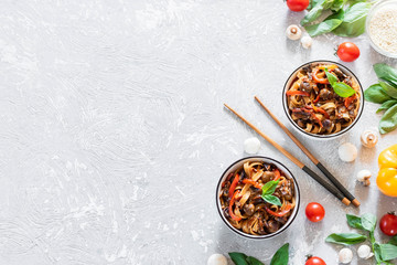 Wheat noodles udon with mushrooms and vegetables in Tereyaki sauce