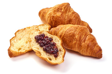 Freshly baked croissants with jam, isolated on white background