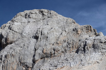 People climbing towards small Triglav