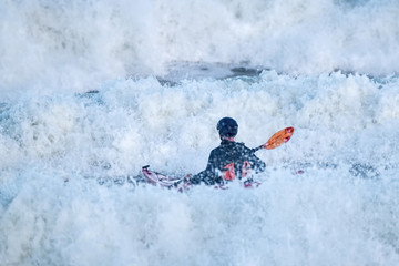 Fototapeta na wymiar Kayaking in heavy seas