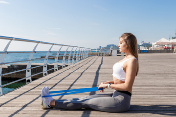 Fototapeta premium Sport woman doing stretching exercises.