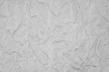 White crumpled packaging paper background texture. Grey Kraft Paper Coarse. Wrinkled paper bag