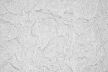 White crumpled packaging paper background texture. Grey Kraft Paper Coarse. Wrinkled paper bag