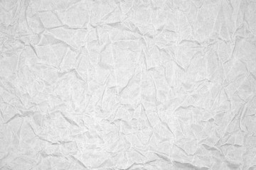 White crumpled packaging paper background texture. Grey Kraft Paper Coarse. Wrinkled paper bag