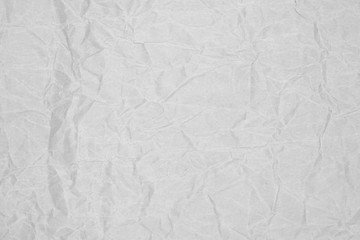 Fototapeta premium White crumpled packaging paper background texture. Grey Kraft Paper Coarse. Wrinkled paper bag