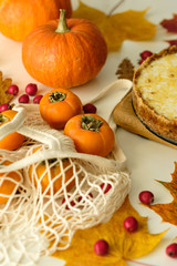 pumpkin cheesecake with persimmon. autumn concept.