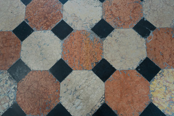 Old, colorful marble tiles. Texture of tiles. Background photo. Venice. Italy. Pattern.