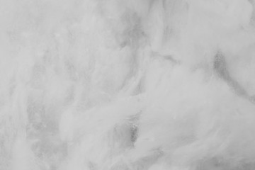 White cotton texture is soft, fluffy wadding background closeup