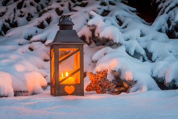 lantern for christmas in the snow