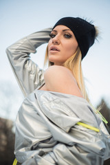 Beautiful young woman in winter clothes