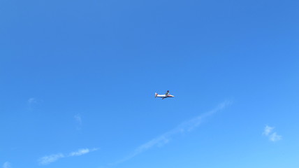 A small plane in the sky
